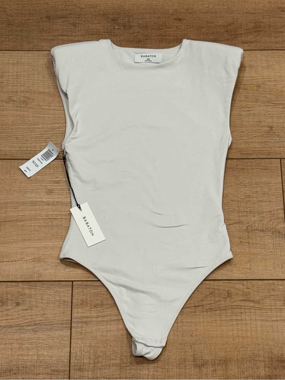 NWT Aritzia Babaton Contour Shoulder Pad Bodysuit Matte Pearl 2XS